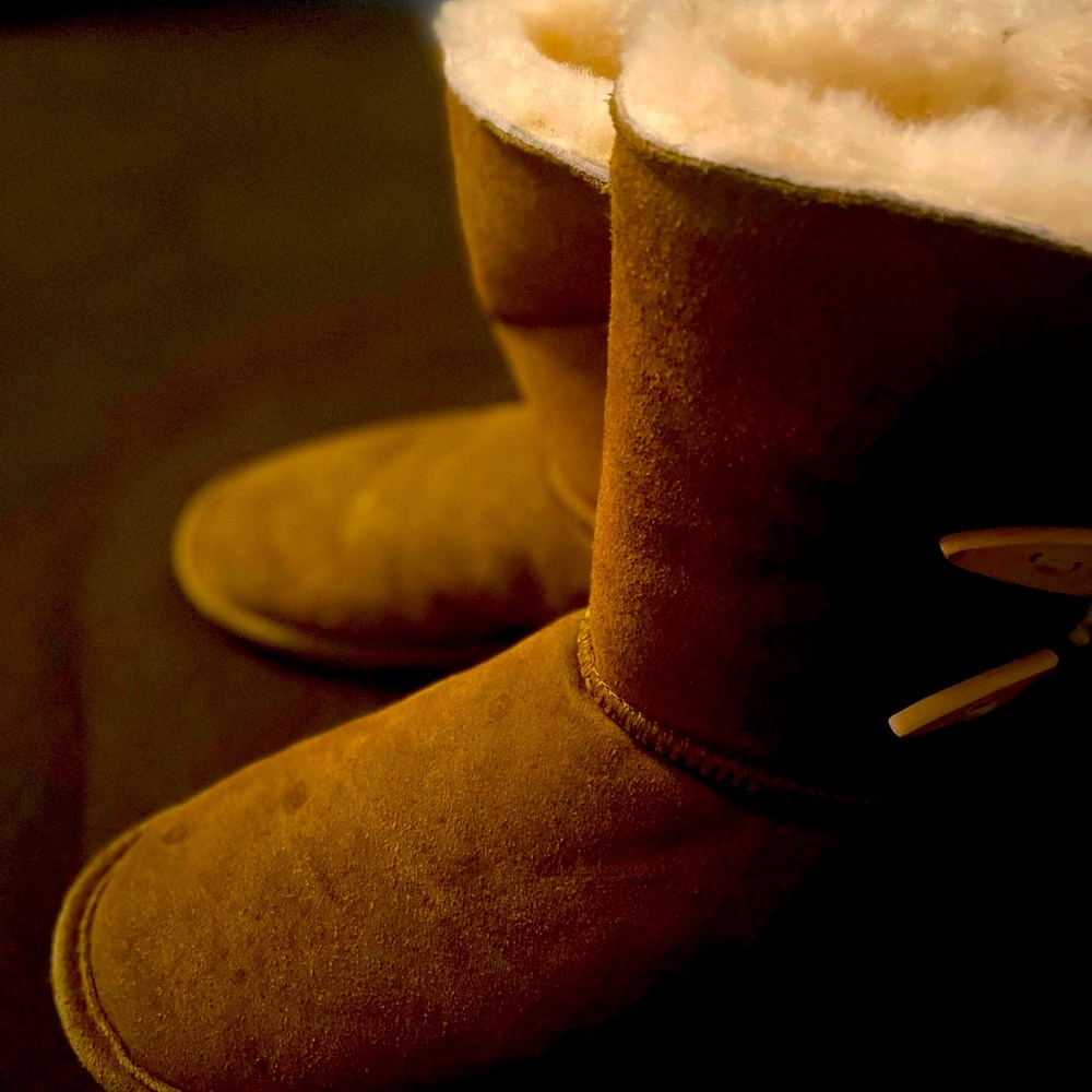 Women’s BearPaw size 10 button side flat sole suede boots.
